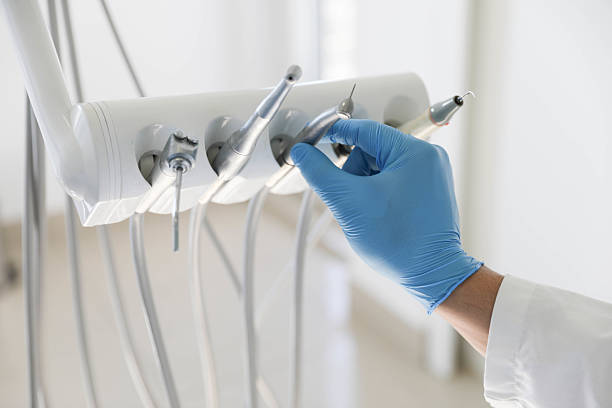Professional Tooth Extraction technician working in McPherson County County, KS